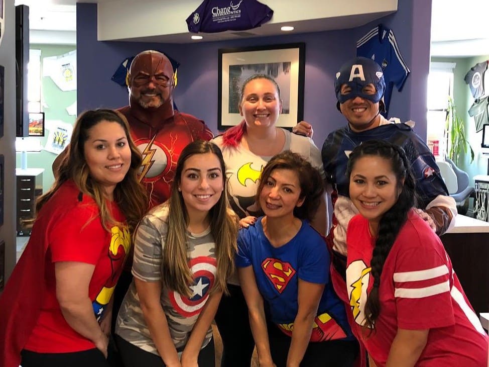 The Chang Orthodontics team dressed as superheroes for Halloween